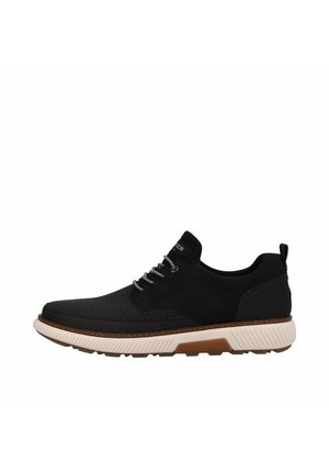 Schwarzer Mesh-Sneaker mit grauen Schnürsenkeln, Gummisohle mit strukturierten Akzenten und einer kontrastierenden, hellen Zwischensohle.