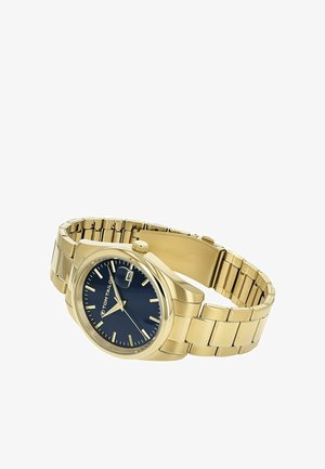 Gold metal wristwatch with black face, silver hour markers, three hands, date window, and linked bracelet band.