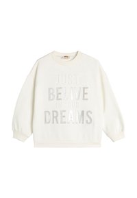 Sudadera blanca de manga larga para niños con puños acanalados y el texto "SOLO CREE EN TUS SUEÑOS" en letras grises y blancas en la parte frontal.
