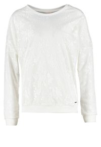 Pull blanc à manches longues avec un motif floral subtil en relief et des poignets et un ourlet côtelés.