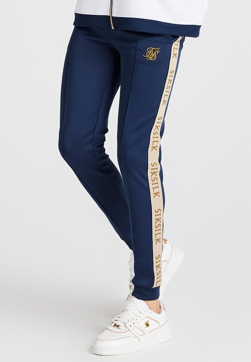 SIKSILK RETRO Tracksuit bottoms navy/dark blue Zalando.ie