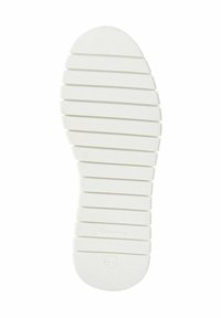 Semelle de chaussure en caoutchouc blanche avec des rainures horizontales pour la traction, bout arrondi et détail de marque au talon, taille 37 indiquée.