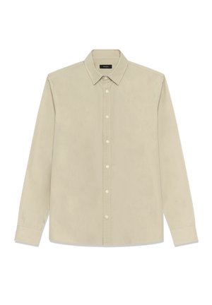 Lysebeige langærmet skjorte lavet af blød bomuld. Har button-down krave, knapper foran og en figursyet pasform med manchetærmer.