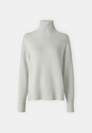 Light gray knitted sweater with a high ribbed collar, dropped shoulders, and ribbed hem and cuffs. Soft texture, relaxed fit.