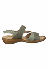 Green leather sandals with multiple straps and open toe design. Features a cushioned insole and brown rubber sole with stitching details.