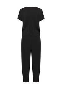 Schwarzer Jumpsuit mit kurzen Ärmeln, Rundhalsausschnitt und Reißverschluss im Rücken. Glatte Textur, taillierter Schnitt und schmal zulaufendes Bein.