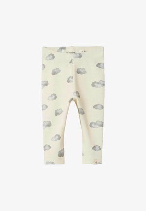Világoskrémszínű leggings, puha pamut anyagból, szürke felhőmintákkal díszítve. Komfortos, rugalmas derékpánt.