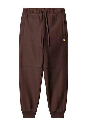 Pantalones deportivos Carhartt marrones con cintura y puños elásticos, bolsillos laterales y pequeño logo amarillo en el muslo izquierdo.
