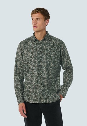 Een langemouwen shirt met een groen en grijs cirkelpatroon, voorzien van een button-down kraag en zwarte knopen op een gladde stoftextuur.