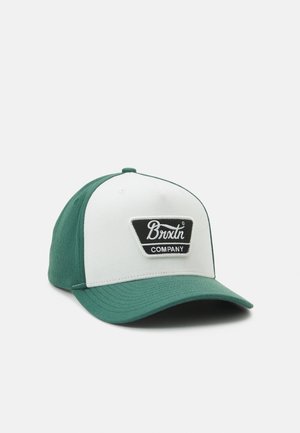 Green and white baseball cap with curved brim featuring a black and white Brixton Company patch on the front panel.