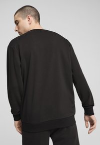 Puma POWER GRAPHIC  - Sweatshirt - black