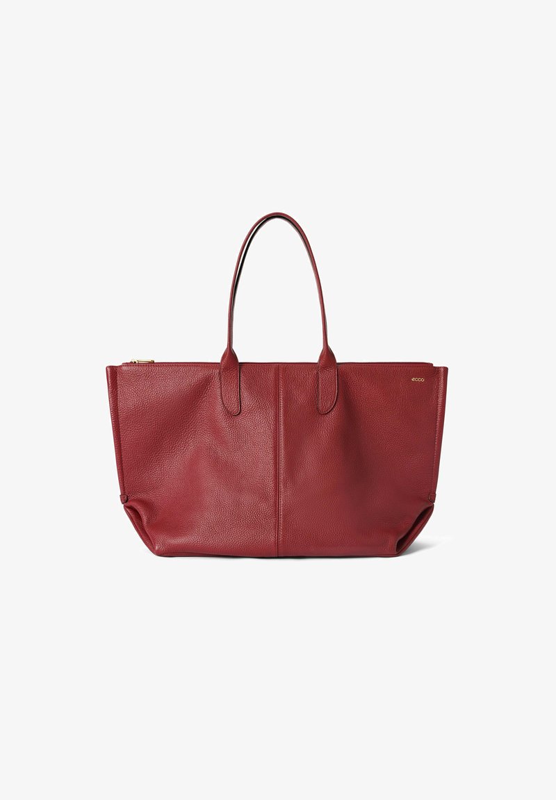 Sac tote en cuir rouge avec deux poignées robustes, finition texturée et design simple. Doté d'une fermeture zip et de détails minimaux.