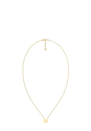 Guldkæde med et minimalistisk design, der har et vedhæng i form af det store bogstav "M". Kæden er delikat og har en lås med en forlængelse.