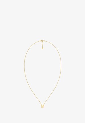Kuldne kaelakee, millel on minimalatiivne disain ja millel on peal kiri "M". Ahel on õrn ja varustatud lukuga, mis sisaldab pikendust.