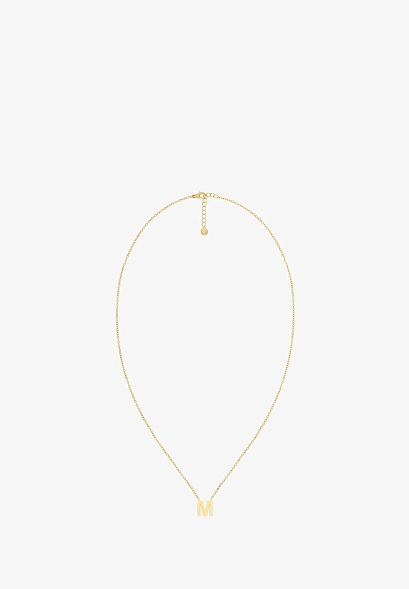 Guldkæde med et minimalistisk design, der har et vedhæng i form af det store bogstav "M". Kæden er delikat og har en lås med en forlængelse.