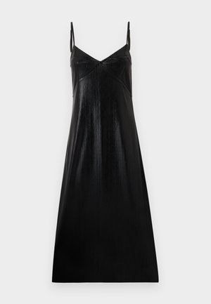 Abito nero senza maniche con una leggera lucentezza, scollatura a V e design minimalista. Realizzato in tessuto liscio e testurizzato, cade in modo morbido.