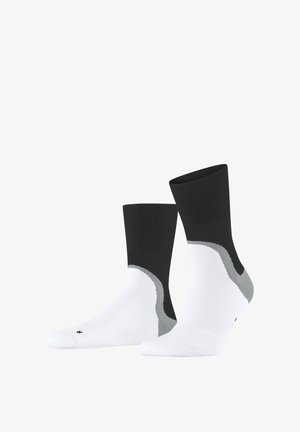 Para skarpet do połowy łydki z czarnymi, białymi i szarymi blokami kolorów, pokazująca orientację lewej i prawej stopy na białym tle.