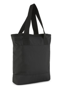 Sac cabas noir avec deux larges bretelles et un fond renforcé, présenté sur fond blanc.