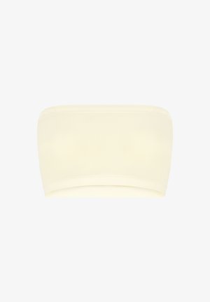 Top bandeau senza spalline di colore bianco sporco con tessuto liscio e senza cuciture o decorazioni visibili.