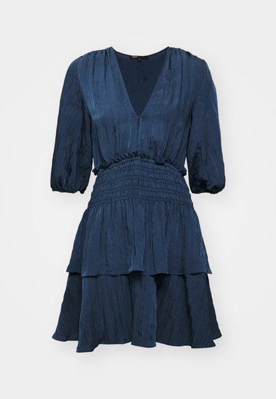 Rochie bleu marin cu decolteu în V, mâneci tip balon și talie elastică. Prezintă o fusta în straturi dintr-o țesătură texturată.