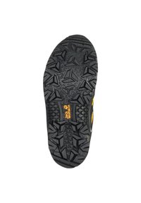 Svart yttersåle med uttalte såler for grep, med et teksturert mønster og en fremtredende oransje logo. Holdbart gummimateriale.