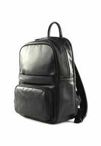 Sac à dos en cuir noir au design rectangulaire élégant, comportant deux compartiments zippés et des bretelles rembourrées étroites.