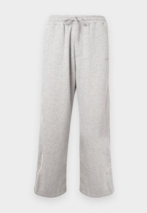 Pantaloni de trening gri, dintr-o țesătură moale, cu un talie elastică prevăzută cu șnur și accente pe cusăturile laterale de o culoare contrastantă.