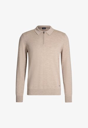 Pull en beige avec col et demi-fermeture éclair. Manches longues, ourlet et poignets côtelés. Texture en tricot lisse au design minimaliste.