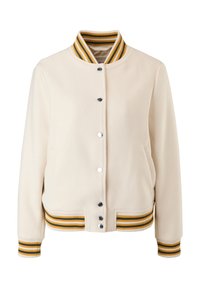 Veste universitaire crème avec col et poignets côtelés rayés verts et jaunes. Comprend des boutons-pression et des poches latérales, tissu texturé.