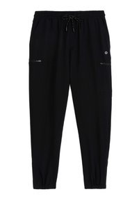 Zwarte joggingbroeken van een zachte stof, met een elastische tailleband, trekkoord, zijzakken en ritssluitingen.
