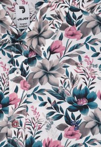 Korte mouwen overhemd met bloemenpatroon, gekenmerkt door roze en teal bloemen op een witte achtergrond, met een button-down kraag en logo-detail.