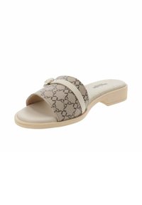 Infradito con tomaia in tessuto beige con un motivo geometrico, cinturino crema e tacco basso a blocco per un comfort facile da indossare.
