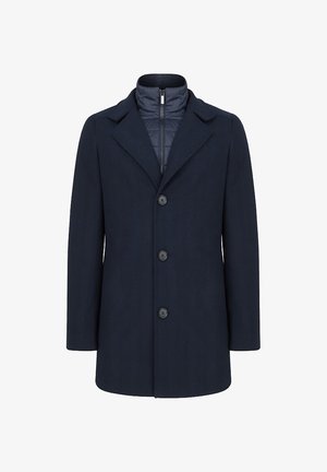 Granatowy płaszcz z mieszanki wełny z ostrym kołnierzem, wewnętrzną warstwą na suwak i pięcioma guzikami. Charakteryzuje się gładką teksturą i uporządkowaną sylwetką.