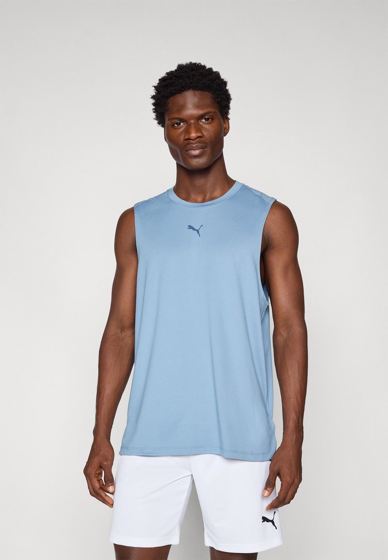Light blue sleeveless athletic shirt with round neckline and soft texture; features a small black Puma logo on the chest.