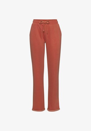 Rozā svārki ar brīvu piegriezumu, ar auklu viduklī un mīkstu audumu. Ar taisnām kājām un apakšmalēm ar nelielu norakstu detaļu.