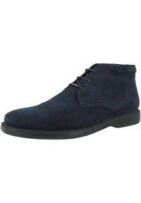 Botas de tobillo de ante azul marino con punta redondeada, cordones en la parte delantera y suela de goma lisa. Presenta costuras sutiles y un diseño elegante.