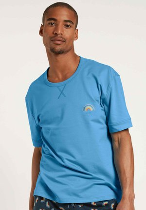 Blue short-sleeve t-shirt made of cotton, featuring a round neckline and a small rainbow embroidery on the left chest. Smooth texture.