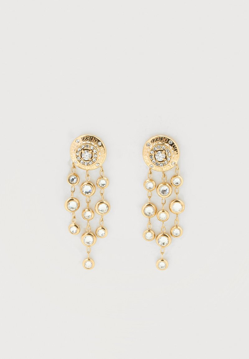 Κρεμαστά σκουλαρίκια σε χρυσό τόνο με πολλαπλούς στρογγυλούς διαυγείς κρυστάλλους τοποθετημένους σε τρεις κάθετες σειρές από μια κυκλική βάση με στρας.