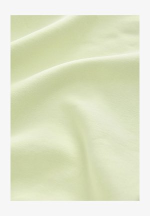 Hele roheline kangas, millel on sile ja pehme tekstuur, näidates peent elastsust ja lihtsat disaini, mis on hõlpsasti volditud.