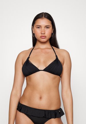 Black bikini set featuring a textured triangle top with halter neck ties and a ruffled bottom, both made from smooth fabric.