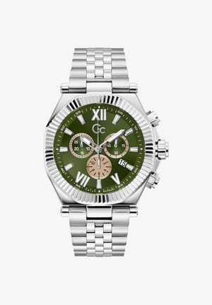 Srebrny zegarek metalowy z ośmiokątną kopertą, zieloną tarczą i kontrastującymi brązowymi subtarczami. Posiada duże cyfry rzymskie oraz okno daty.