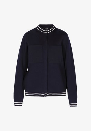 Mørke blå strikket cardigan med hvidstribede krave og manchetter, der har to forlommer og lynlås. Blød tekstur og afslappet pasform.