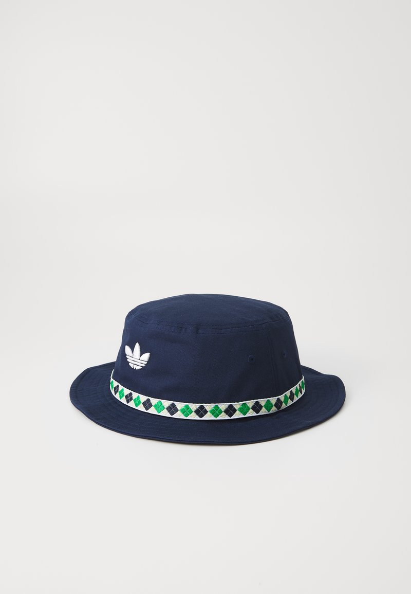 Navy blue cotton bucket hat with white embroidered logo and a patterned green and black band around the crown. Flat, wide brim.