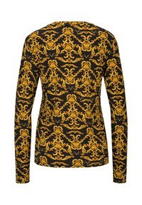 Langärmliges Hemd aus schwarzem Stoff mit einem aufwendigen gelben Barockmuster. Rundhalsausschnitt und tailliertes Design mit minimalen Nähten.