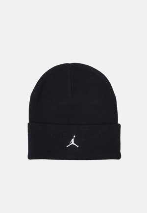 Black knit beanie with a folded cuff and a white embroidered Jumpman logo on the front. Soft texture and standard shape.