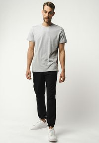 MELA RAJESH - Cargobroek - schwarz