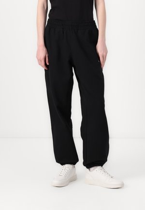 Calvin Klein Jeans MONOLOGO - Treniņtērpa apakšdaļas - black