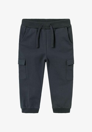 Schwarze Kinder-Jogginghosen mit elastischem Bund, Kordelzug, seitlichen Klapptaschen und gerippten Bündchen.