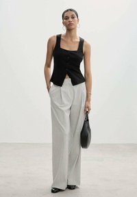 Mango Smanicato - black