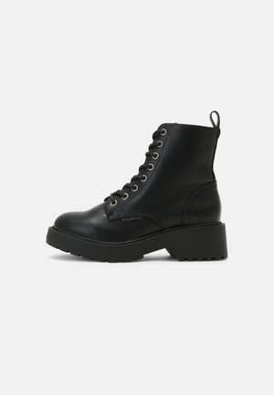 Bottines à plateau - black